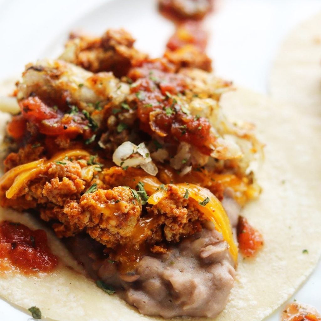 Mexican Chorizo with scrambled eggs, cheese, hashbrowns and Refried Beans! 