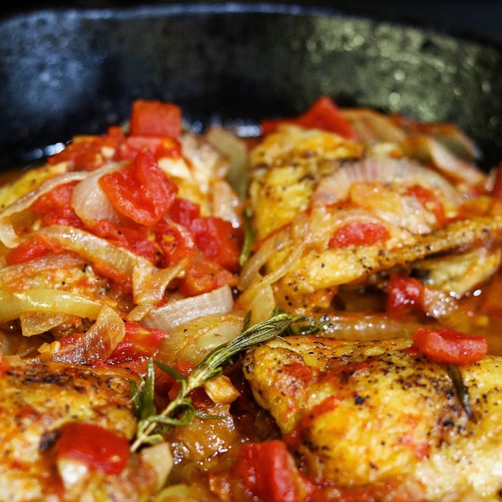 Chicken Thighs Braised with Tomatoes, Onions, and Garlic