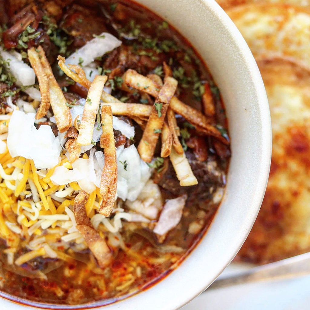 Texas Brisket Chili
This Texas Brisket Chili has "No Beans".  That is because we don't eat beans in our chili in Texas.  Truth. We do like lots of toppings like cheese, onions, jalapenos, sometimes sour cream and even guacamole.   So good! 