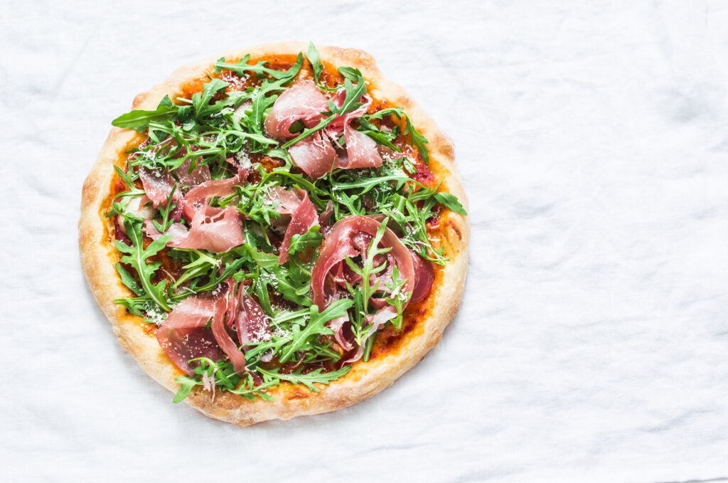 Prosciutto arugula pizza